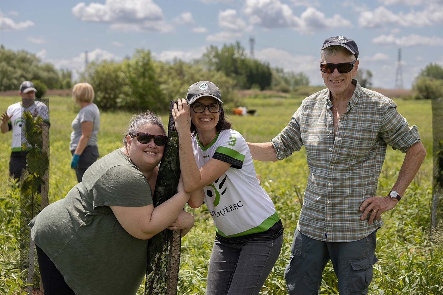 Volunteers planting trees 