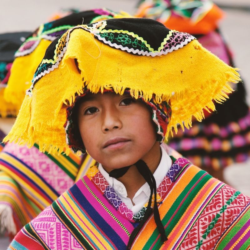 Child wearing Andes traditional clothing