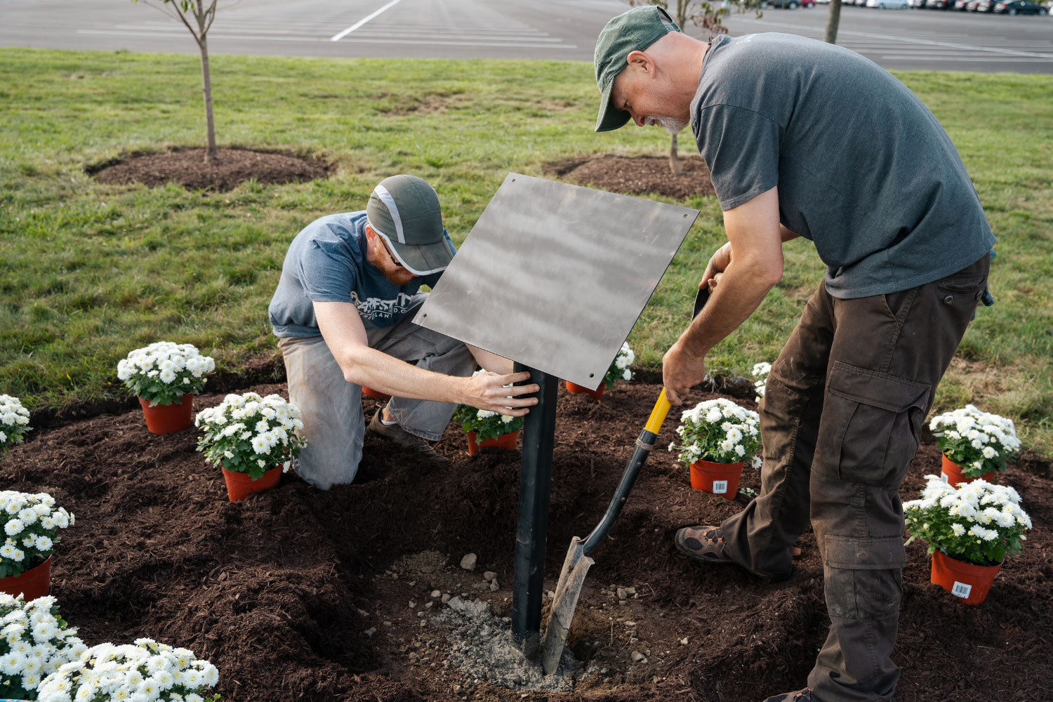 Men installing sign